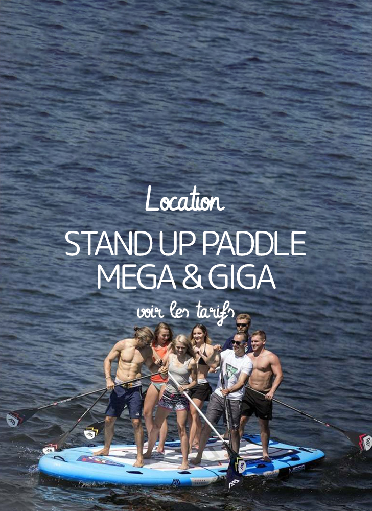 image d'un groupe d'amis fait du stanp up paddle gonflable pour 4 à 6 personnes arrivant sur une plage en tombant
